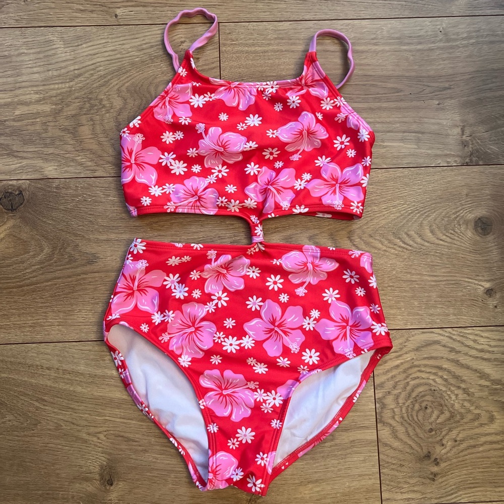 Fun Art Class 1 piece but more like a bikini. Size 10-12